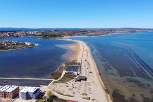 an aerial view of a beach and the ocean at Apartment Wali in Nin +27 photos
