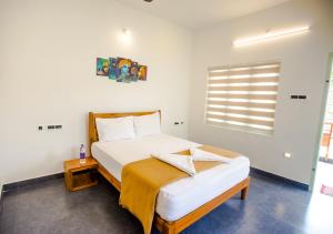Postel nebo postele na pokoji v ubytování Ocean View Beach Villa Varkala by VOYE HOMES