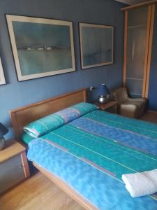 Кровать или кровати в номере Casa jabatos