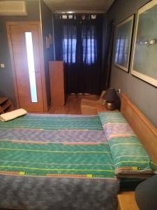 Кровать или кровати в номере Casa jabatos