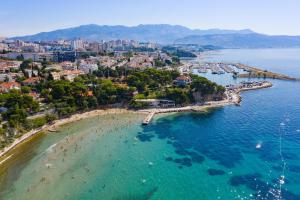 an aerial view of a beach in the water at Luxury Apartment Anna in Split