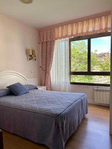 Кровать или кровати в номере Hospedaje de La Hoz