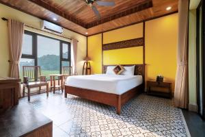 Postelja oz. postelje v sobi nastanitve Dong Ne Tam Coc Hotel & Resort