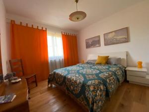 Postel nebo postele na pokoji v ubytování Villa Rosa Friuli