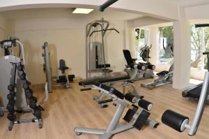 a gym with several exercise bikes and treadmills at Kırtay Hotel Erdek in Erdek