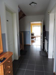 TV a/nebo společenská místnost v ubytování Ferienhaus-Sina