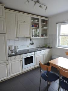 Kuchyň nebo kuchyňský kout v ubytování Ferienhaus-Sina