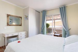 Ένα ή περισσότερα κρεβάτια σε δωμάτιο στο Villa Gaia