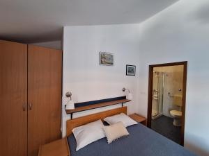 Postel nebo postele na pokoji v ubytování Sobe MaMaLu