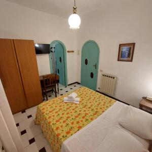 Voodi või voodid majutusasutuse B&B Giardini di Iside e Osiride toas