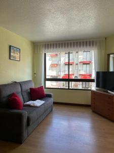 A seating area at Apartamentos de la Hoz