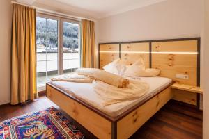 Posteľ alebo postele v izbe v ubytovaní Hotel Garni Ida