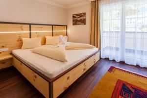 Posteľ alebo postele v izbe v ubytovaní Hotel Garni Ida