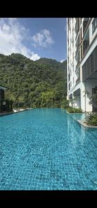 Bazén v ubytování Doma House Onsen at Sunway Onsen, Tambun nebo v jeho okolí