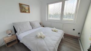 Postel nebo postele na pokoji v ubytování LilLy HOME 36