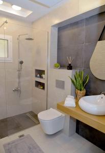 Gallery image of PLÙMA by Platinum River Apartments in Potamós +19 photos