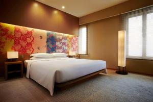 Voodi või voodid majutusasutuse Hyatt Regency Kyoto toas