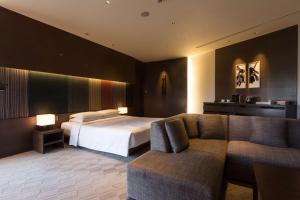 Voodi või voodid majutusasutuse Hyatt Regency Kyoto toas