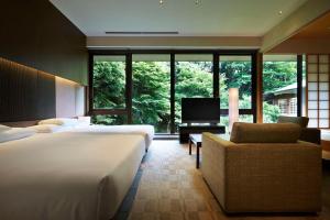 Voodi või voodid majutusasutuse Hyatt Regency Kyoto toas