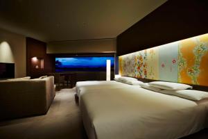 Voodi või voodid majutusasutuse Hyatt Regency Kyoto toas