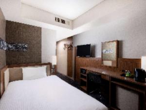TV a/nebo společenská místnost v ubytování ibis Styles Tokyo Ginza