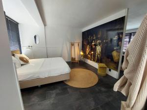 Postel nebo postele na pokoji v ubytování rembrandtsbeachsuite + 25 fotografií