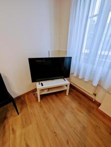 Telewizja i/lub zestaw kina domowego w obiekcie Wohnung im Zentrum von Graz