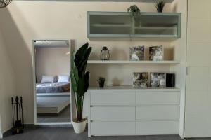 Postel nebo postele na pokoji v ubytování DeKo Penthouse Suite