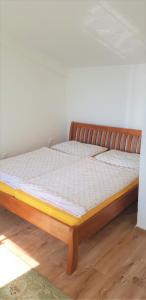 Postel nebo postele na pokoji v ubytování Chata na šírave