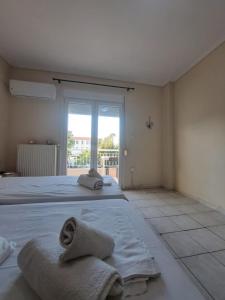 Postel nebo postele na pokoji v ubytování INFINITY Center Apartment