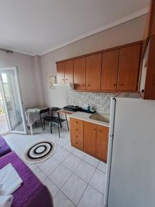 Kuchyň nebo kuchyňský kout v ubytování INFINITY Center Apartment