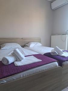 Postel nebo postele na pokoji v ubytování INFINITY Center Apartment