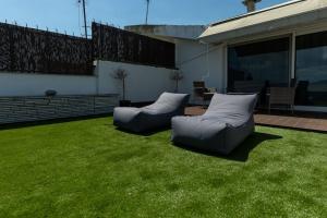 Posezení v ubytování DeKo Penthouse Suite