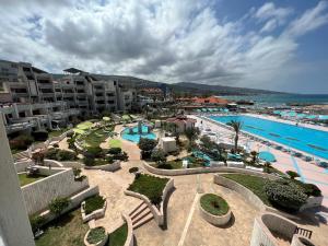 an aerial view of a resort with a swimming pool at Chalet at Aqualand Resort in Batroûn