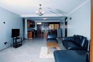 Μια τηλεόραση ή/και κέντρο ψυχαγωγίας στο Munyonyo Heights Apartments