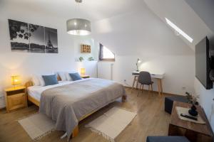 Voodi või voodid majutusasutuse Fonyód City Apartman toas