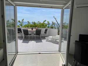 Balkon lub taras w obiekcie Mirakul Apartments