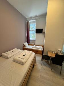 Ein Bett oder Betten in einem Zimmer der Unterkunft Stadtoase im Herzen Berlins