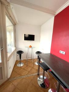 TV a/nebo společenská místnost v ubytování Chambre Privée en colocation dans un appartement Vaulx en Velin Centre