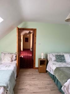 Katil atau katil-katil dalam bilik di Dal Riada B&B