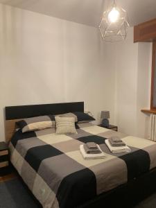 Ліжко або ліжка в номері Appartamento Poli