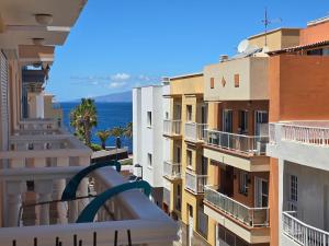 a view from the balcony of a building at Beautiful Apartment by the Sea in Playa San Juan in Playa de San Juan
