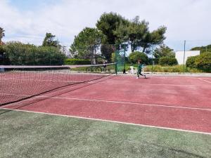 Tenis a/nebo squash v ubytování Alle Volte Petite Maison nebo okolí