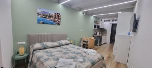 Un pat sau paturi într-o cameră la Le Antiche Porte