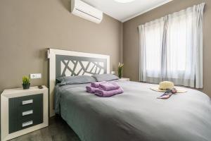 Posteľ alebo postele v izbe v ubytovaní Nerja City Center Apartment - Happy Rentals