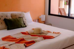 Cama o camas de una habitación en Hotel Amavi