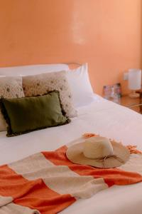 Cama o camas de una habitación en Hotel Amavi
