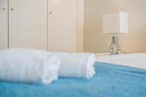 Ένα ή περισσότερα κρεβάτια σε δωμάτιο στο GuestReady - Enigma Apartments +72 φωτογραφίες