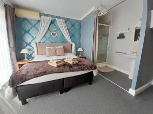 Voodi või voodid majutusasutuse Juliette's toas