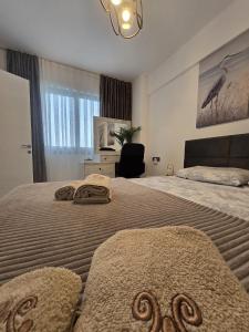 Kama o mga kama sa kuwarto sa LUXURY Pool View Edelweiss Brand New 1-Bedroom Apartment with free Waterpark